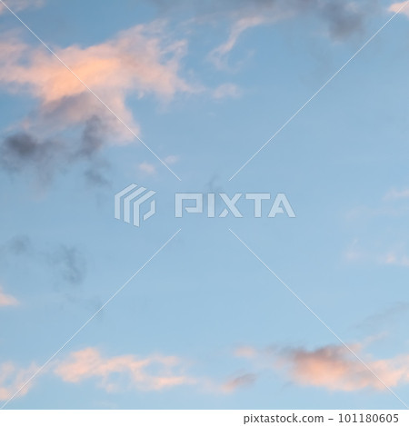 Background of blue sky with pale pink clouds at sunset Background of blue sky with pale pink clouds at sunset 101180605