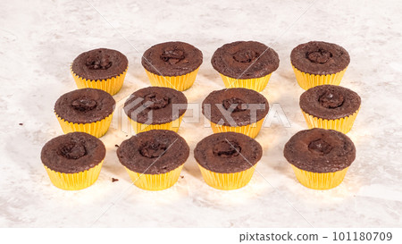 Step by step. Filling in chocolate cupcakes with chocolate ganache. Step by step. Filling in chocolate cupcakes with chocolate ganache. 101180709