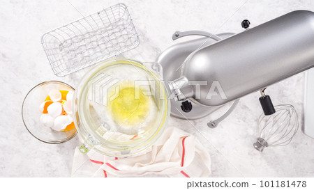 Flat lay. Step by step. Mixing ingredients in kitchen mixer to bake unicorn meringue pops cookies. Flat lay. Step by step. Mixing ingredients in kitchen mixer to bake unicorn meringue pops cookies. 101181478