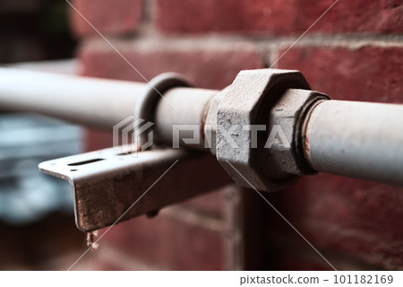 rusty screws and pipes 101182169