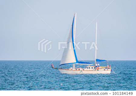 Sailing yacht in the blue calm sea. 101184149