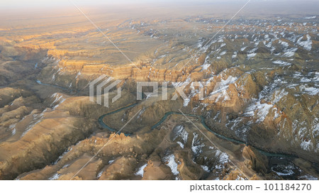 Charyn Grand Canyon with orange rock walls. Almaty 101184270