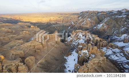 Charyn Grand Canyon with orange rock walls. Almaty 101184286
