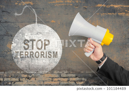 Businessman showing stop terrorism sign Businessman showing stop terrorism sign 101184489