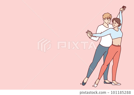 Young couple man and woman performs passionate dance semba salsa or kizomba bachata Young couple man and woman performs passionate dance semba salsa or kizomba bachata 101185288