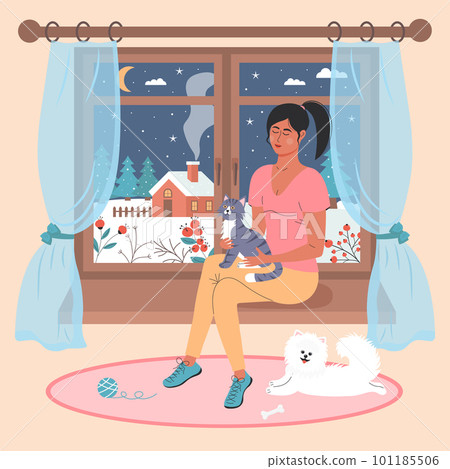 Girl with a cat sitting on the window. White spitz lying on the rug nearby. There is a winter night landscape outside the window. Winter mood, love pets, relaxing, cozy home concept. Girl with a cat sitting on the window. White spitz lying on the rug nearby. There is a winter night landscape outside the window. Winter mood, love pets, relaxing, cozy home concept. 101185506