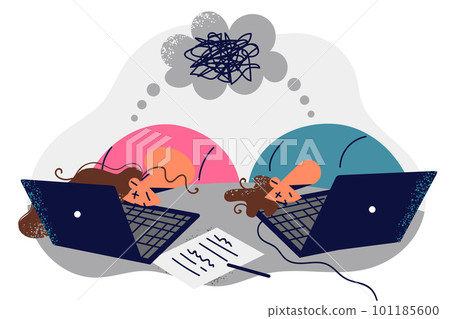 Burntout employees of company sit with heads on table near laptop due to confusion in work tasks Burntout employees of company sit with heads on table near laptop due to confusion in work tasks 101185600