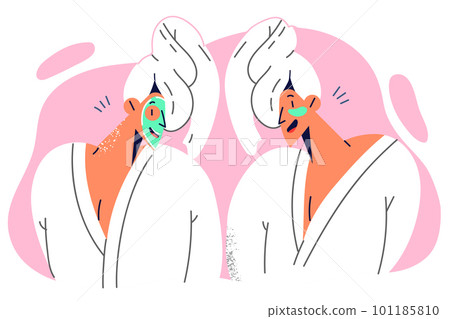 Women are standing in bathrobes and towels for spa procedures and cosmetic masks for face and eyes 101185810