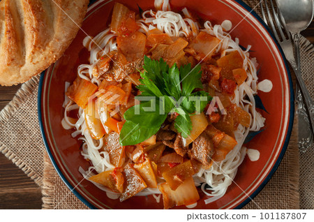 Uighur lagman with parsley and basil. Uighur lagman with parsley and basil. 101187807
