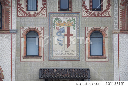 Coat of arms of the Visconti family and the coat of arms of the city of Milan on the building seen from the courtyard side of Castello Sforzesco, a citadel in Milan 101188161