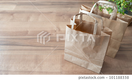 Brown paper bags and handbags placed on the floor Brown paper bags and handbags placed on the floor 101188338