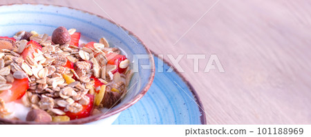 Fresh Strawberry yogurt and muesli bowl banner Fresh Strawberry yogurt and muesli bowl banner 101188969