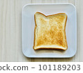 Bread on a white plate 101189203