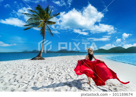 Tourist walking on tropical beach at Koh yao yai island, Thailand. Tourist walking on tropical beach at Koh yao yai island, Thailand. 101189674