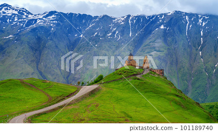 Gergeti Trinity Church (Tsminda Sameba) in Kazbegi, Georgia. 101189740