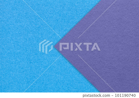 Texture of blue paper background, half two colors with violet arrow, macro. Structure of craft turquoise cardboard. Texture of blue paper background, half two colors with violet arrow, macro. Structure of craft turquoise cardboard. 101190740
