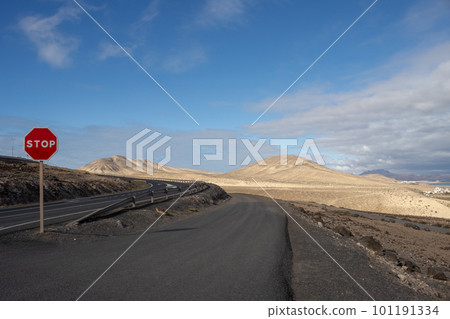 Stop sign and a mountain, Fuerteventura 101191334
