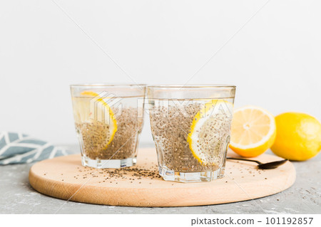 Healthy breakfast or morning with chia seeds and lemon on table background, vegetarian food, diet and health concept. Chia pudding with lemon 101192857