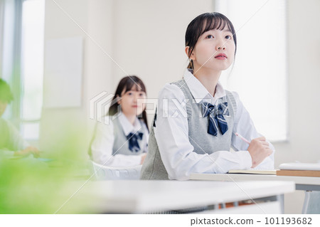 High school students taking classes seriously in the classroom High school students taking classes seriously in the classroom 101193682