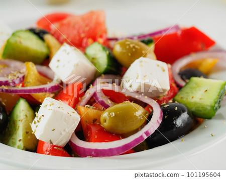 Greek salad on the table, close up 101195604