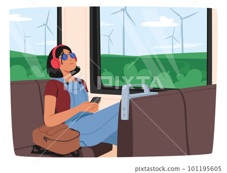 Young Woman Listening To Music With Headphones While Riding The Train. She Appears Lost In Her Own World 101195605