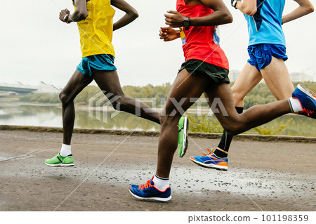 group african and european runners running marathon race, legs jogger run world championships group african and european runners running marathon race, legs jogger run world championships 101198359