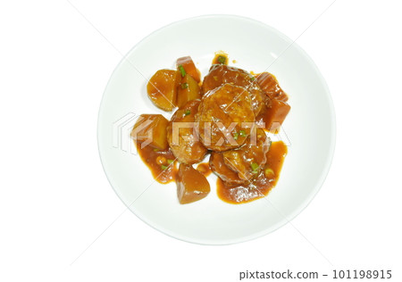 fried mashed chicken steak with carrot in sweet red gravy sauce stew on plate fried mashed chicken steak with carrot in sweet red gravy sauce stew on plate 101198915