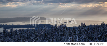 Canadian Mountain Landscape covered in Snow and West Coast in background 101199495