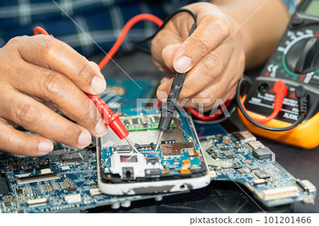Repairing and upgrade circuit mainboard of notebook, electronic, computer hardware and technology concept. Repairing and upgrade circuit mainboard of notebook, electronic, computer hardware and technology concept. 101201466