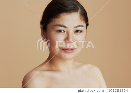 Portrait of modern asian female looking in camera 101201514