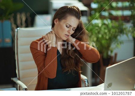 stressed stylish business owner woman in green office stressed stylish business owner woman in green office 101201787