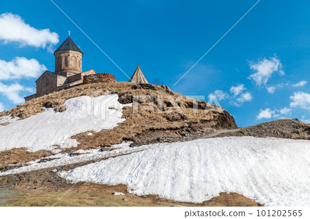 Landscape with Gergeti Trinity Church or Holy Trinity Church, Georgia 101202565