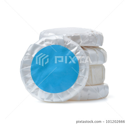Stack of wrapped round hotel soap Stack of wrapped round hotel soap 101202666