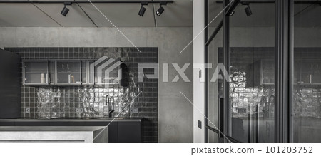 Small kitchen interior in grey and black colours, concrete wall design, glass sliding doors. Contemporary interior design aesthetics with concrete details 101203752