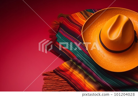 Cinco de Mayo holiday background. Mexican sombrero hat and poncho on magenta background. Generative AI illustration 101204028