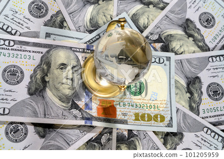 Dollars and the globe. Close-up, top view 101205959