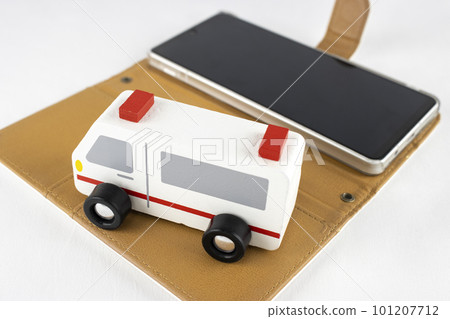 Smartphone and toy ambulance. contact image 101207712