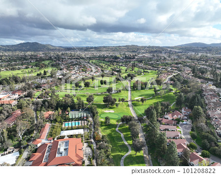 Aerial view of residential neighborhood surrounded by golf and valley during cloudy day in Rancho Bernardo Aerial view of residential neighborhood surrounded by golf and valley during cloudy day in Rancho Bernardo 101208822