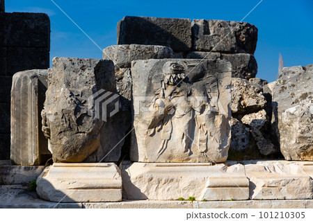 Remained sculptural details on Roman theatre ruins in Tlos, Turkey Remained sculptural details on Roman theatre ruins in Tlos, Turkey 101210305