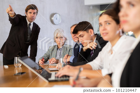 Dissatisfied boss gave dressing down to team of top managers in office Dissatisfied boss gave dressing down to team of top managers in office 101210447