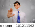 Asian man wear masks  raise your hand to protect PM 2.5 dust and air pollution and headache and sickness, air pollution concept, healthcare concept. 101211392
