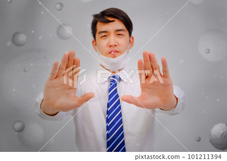 Asian man wear masks raise your hand to protect PM 2.5 dust and air pollution and headache and sickness, air pollution concept, healthcare concept. Asian man wear masks raise your hand to protect PM 2.5 dust and air pollution and headache and sickness, air pollution concept, healthcare concept. 101211394