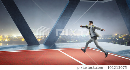 Businessman playing tennis . Mixed media 101213075
