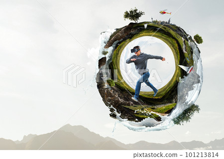 Man wearing virtual reality goggles Man wearing virtual reality goggles 101213814