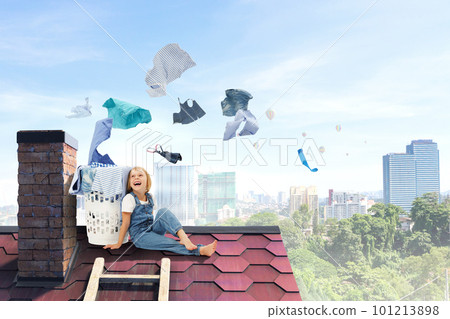 Happy little girl with washed clothes Happy little girl with washed clothes 101213898