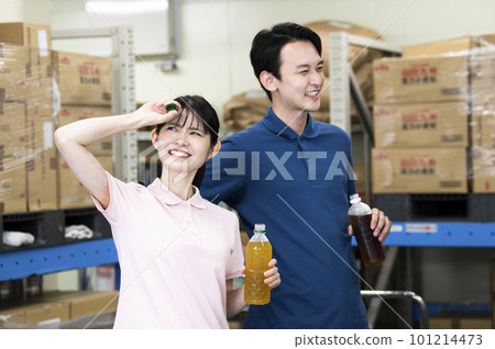 Workers working in the warehouse Break Conversation Hydration Summer 101214473