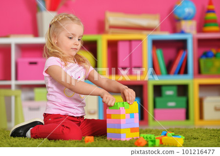 happy cute little girl playing with cubes happy cute little girl playing with cubes 101216477