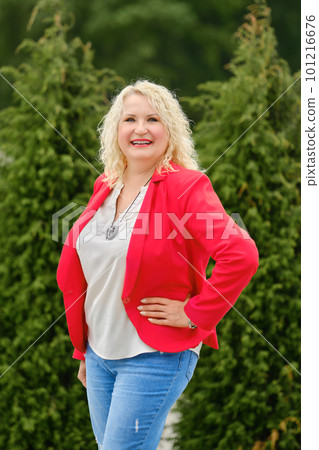 Portrait of middle-aged woman outdoors Portrait of middle-aged woman outdoors 101216676