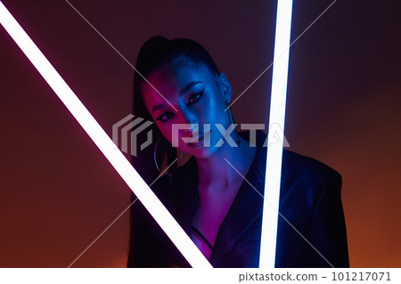 beautiful young woman with neon lamp beautiful young woman with neon lamp 101217071