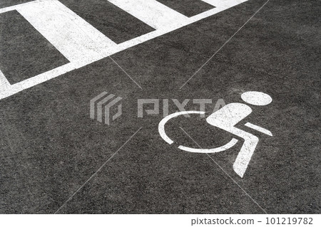 Disabled parking sign on the road Disabled parking sign on the road 101219782